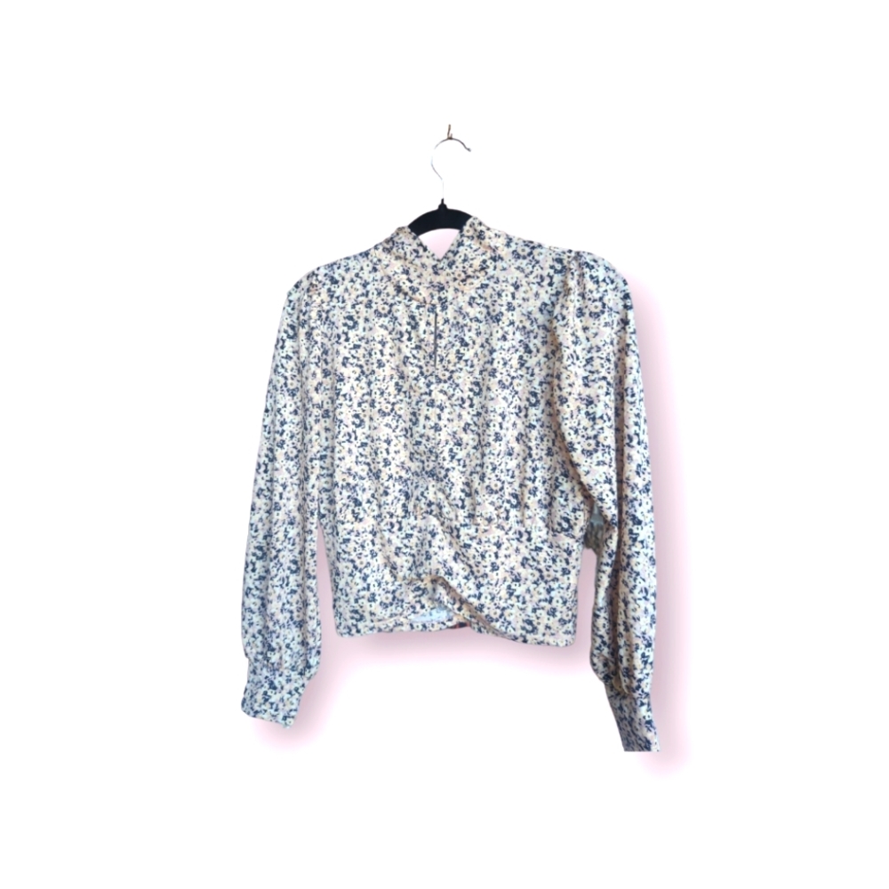 Brand Eclaire. Small size. Cream, with white and black color